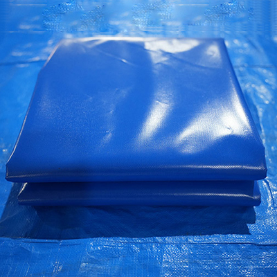 Blue DERFLEX PVC tarpaulin sheets showing the coated surface for custom protective cover development