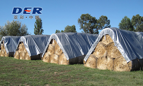Agricultural tarps covering silage and hay