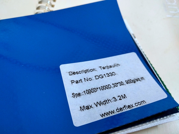 DERFLEX blue coated tarpaulin sample board with a physical material identification label