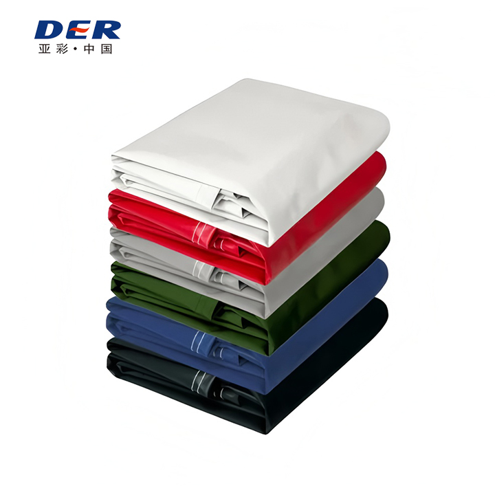 Folded tarps stacked in several colors