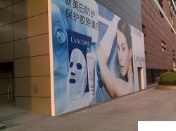 Retail storefront with large printed window graphics