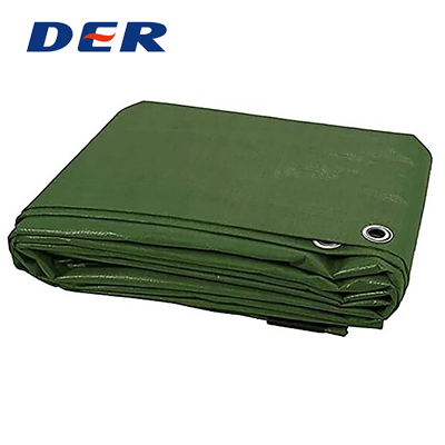 Folded green DERFLEX tarp showing reinforced hems and metal eyelets